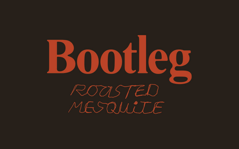 Text reading Bootleg Roasted Mesquite in a bronze font